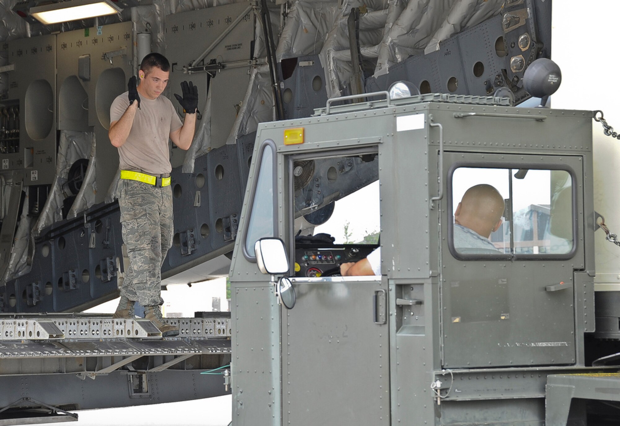 Joint Base McGuire-Dix-Lakehurst Airmen load and secure equipment onto aircraft in preparation of Hurricane Irene. All JB MDL aircraft are being evacuated to Air Force Base's around the country. Community members in and around JB MDL should secure items and take necessary precautions during the hurricane. Visit the JB MDL public website and the Facebook page for updates. (U.S. Air Force photo by Airman Ryan Throneberry/Released)