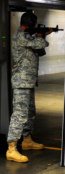 Senior Master Sgt. Michael Jensen, 610th Security Forces Squadron traditional reservist, earned top score, 450 out of 500, at an Excellence in Competition match hosted by the 610th SFS at Naval Air Station Fort Worth JRB, Texas August 24. (U.S. Air Force photo/Senior Airman Martha Whipple) 