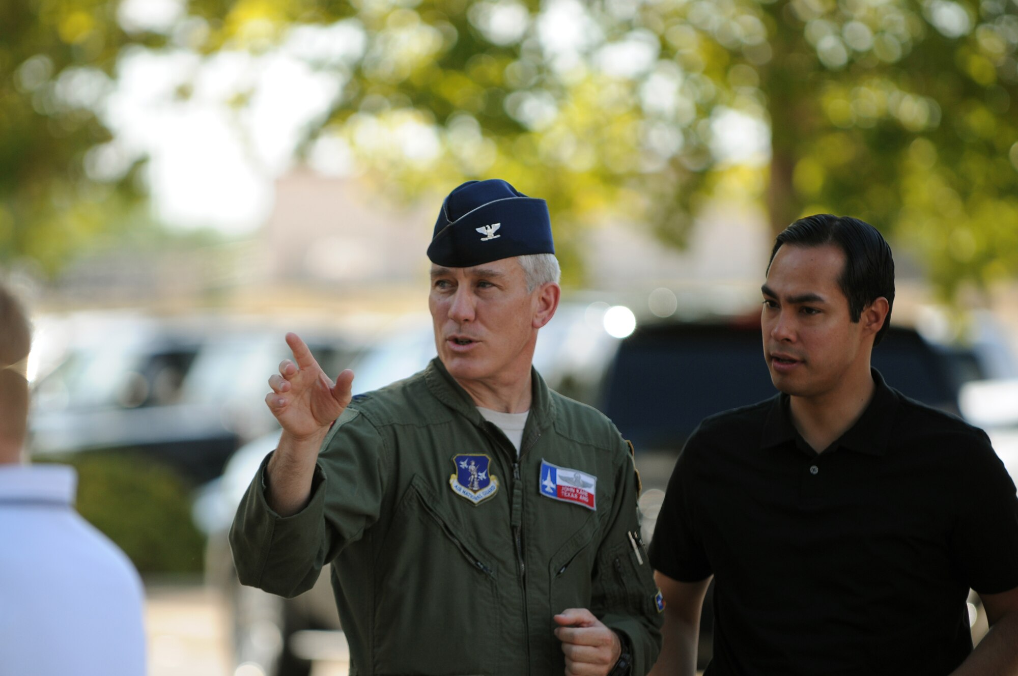 Colonel (Col) John Kane, commander of the 149th Fighter Wing, visits with San Antonio mayor Julian Castro during Texas Air National Guard night with the San Antonio Missions AA baseball club, August 21, 2011.  (Air National Guard photo by SSgt Eric L. Wilson/Released)