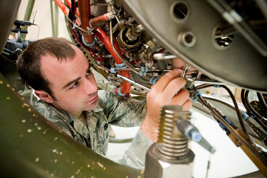 U.S. Air Force Airman Joshua Fennimore, 23rd Component Maintenance Squadron, rebuilds an A-10C Thunderbolt II engine at the 372nd Training Squadron, during a TF-34 Intermediate Maintenance Course, Aug. 23, 2011. The course gave Fennimore and fellow classmates the knowledge required to take apart and rebuild engines for the A-10 aircraft stationed at Moody Air Force Base, Ga. (U.S. Air Force photo by Staff Sgt. Joshua J. Garcia/Released)