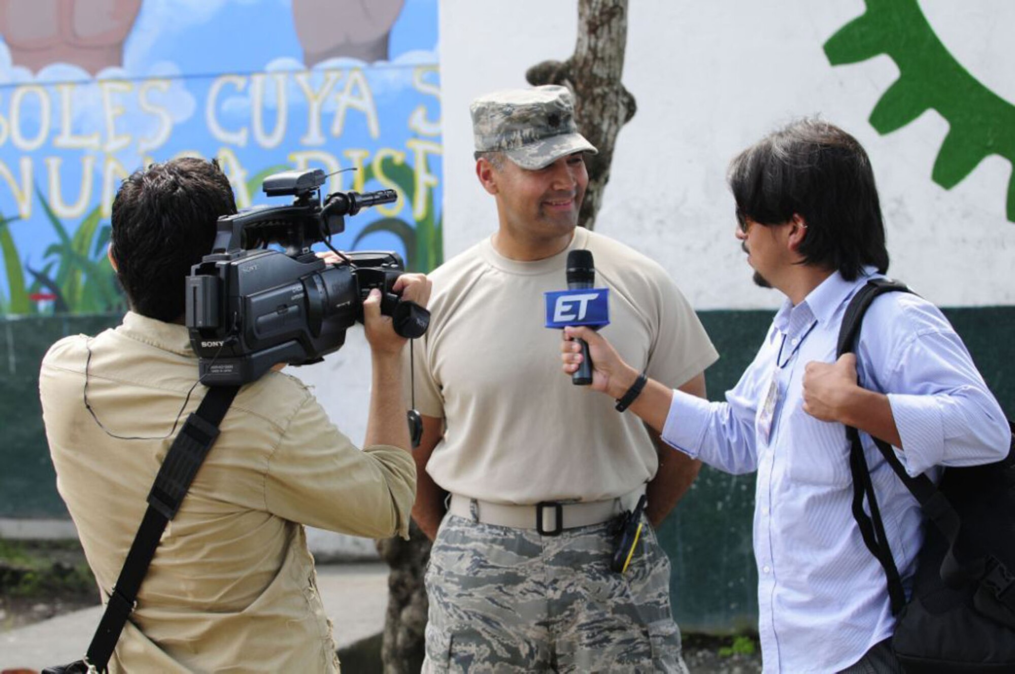 Maj. George B. Nuño of the Cyber/Netcentric Directorate speaks to local reporters in Tumaco, Colombia in early June.  Major Nuño is deployed on the U.S. Naval Ship Comfort, where he is commanding all non-medical Air Force personnel and serving as the Foreign Area Officer. (Courtesy photo)