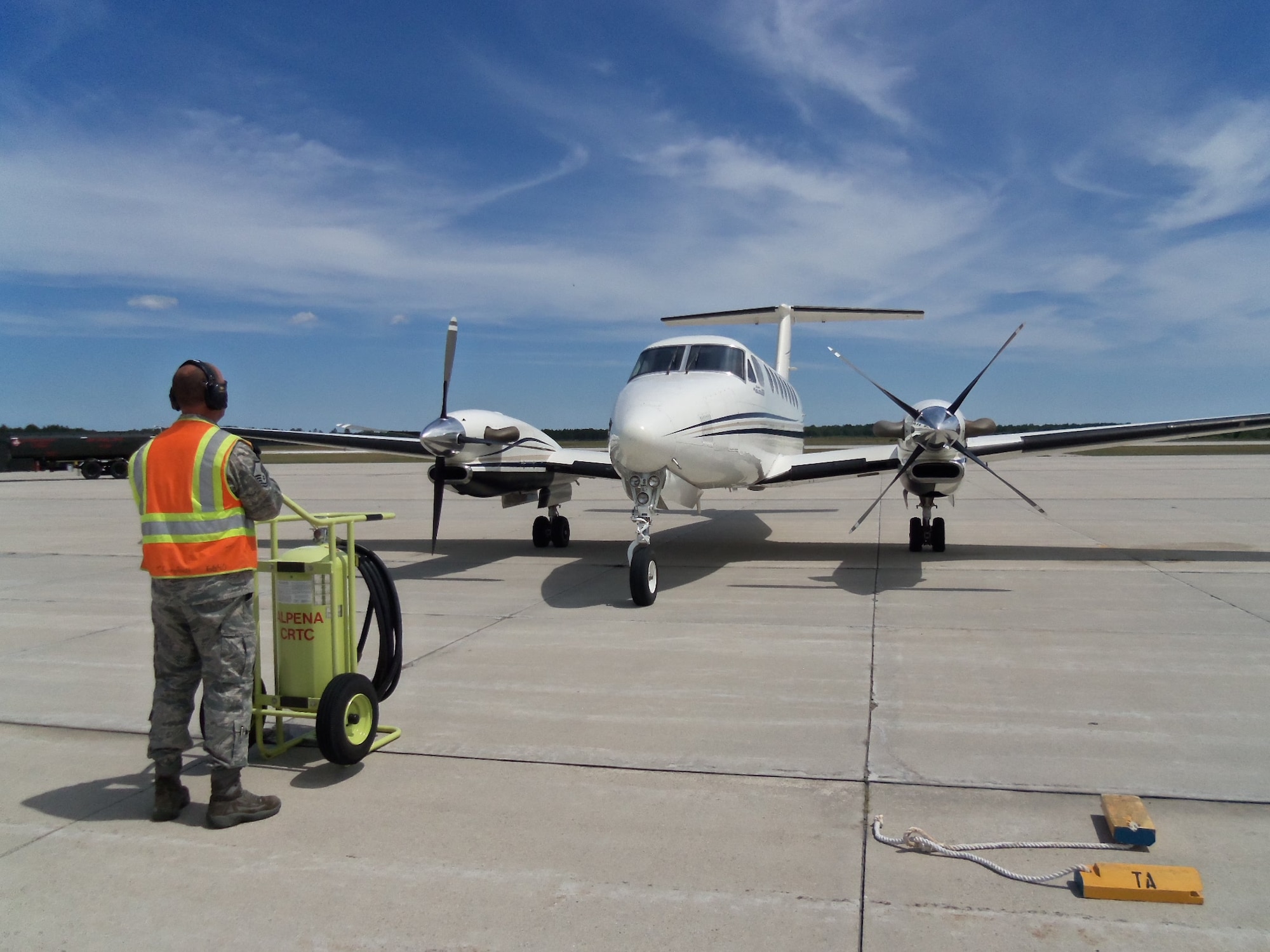 MSgt Tom Campbell prepares for an aircraft to depart the Alpena CRTC.