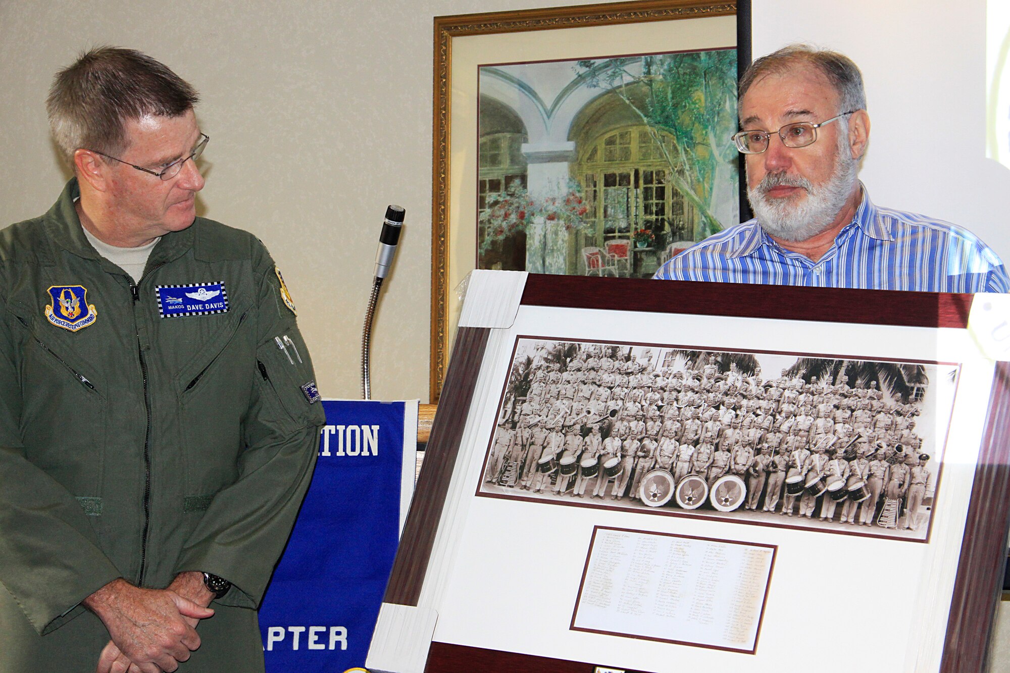 Mr. Steven A.  Edelsetin, on behalf of the Air Force Association, Miami-Homestead chapter, donates a historical photo reprint of his father in 1943 to the Homestead Air Reserve Base on Aug 18. Col David Davis, 482nd Fighter Wing Vice Commander accepts the framed photo on behalf of the base