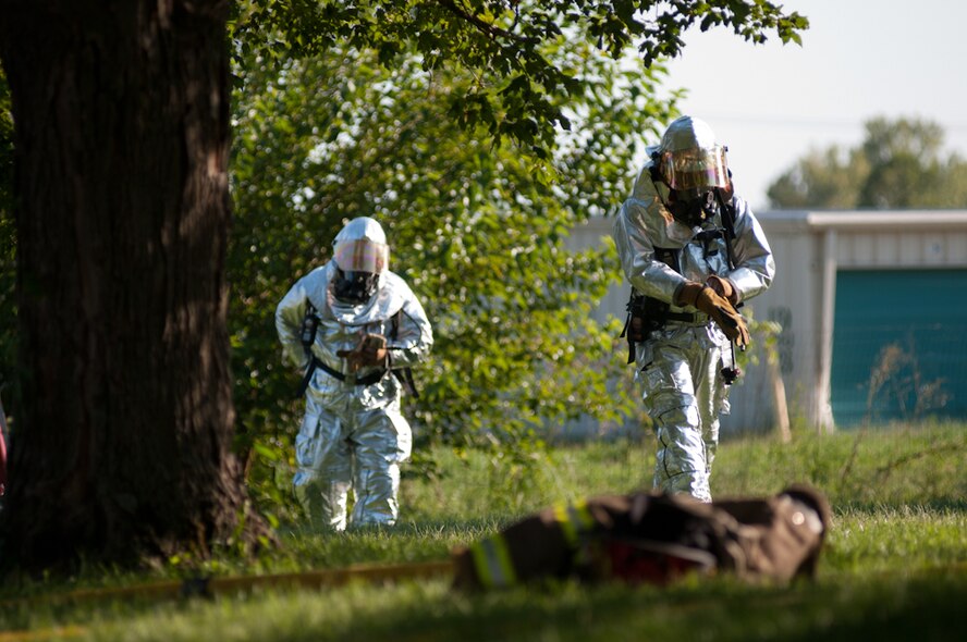 Airmen from the Missouri Air National Guard’s 139th Airlift Wing Fire Department respond to a house fire in Elwood, Ks., on August 25, 2011. The airmen were called to assist a mutual aid with the Doniphan County Volunteer Fire Department. (U.S. Air Force photo by Senior Airman Sheldon Thompson)