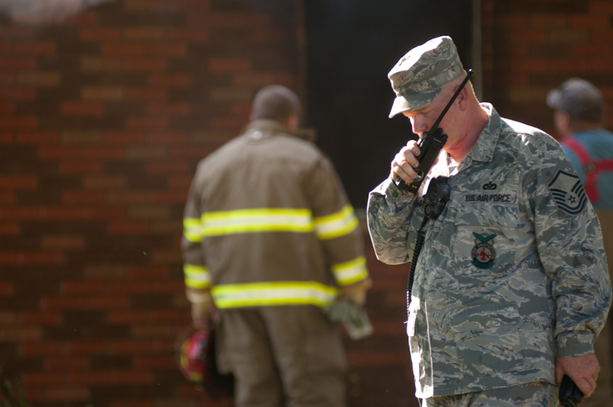 Airmen from the Missouri Air National Guard’s 139th Airlift Wing Fire Department respond to a house fire in Elwood, Ks., on August 25, 2011. The airmen were called to assist a mutual aid with the Doniphan County Volunteer Fire Department. (U.S. Air Force photo by Senior Airman Sheldon Thompson)