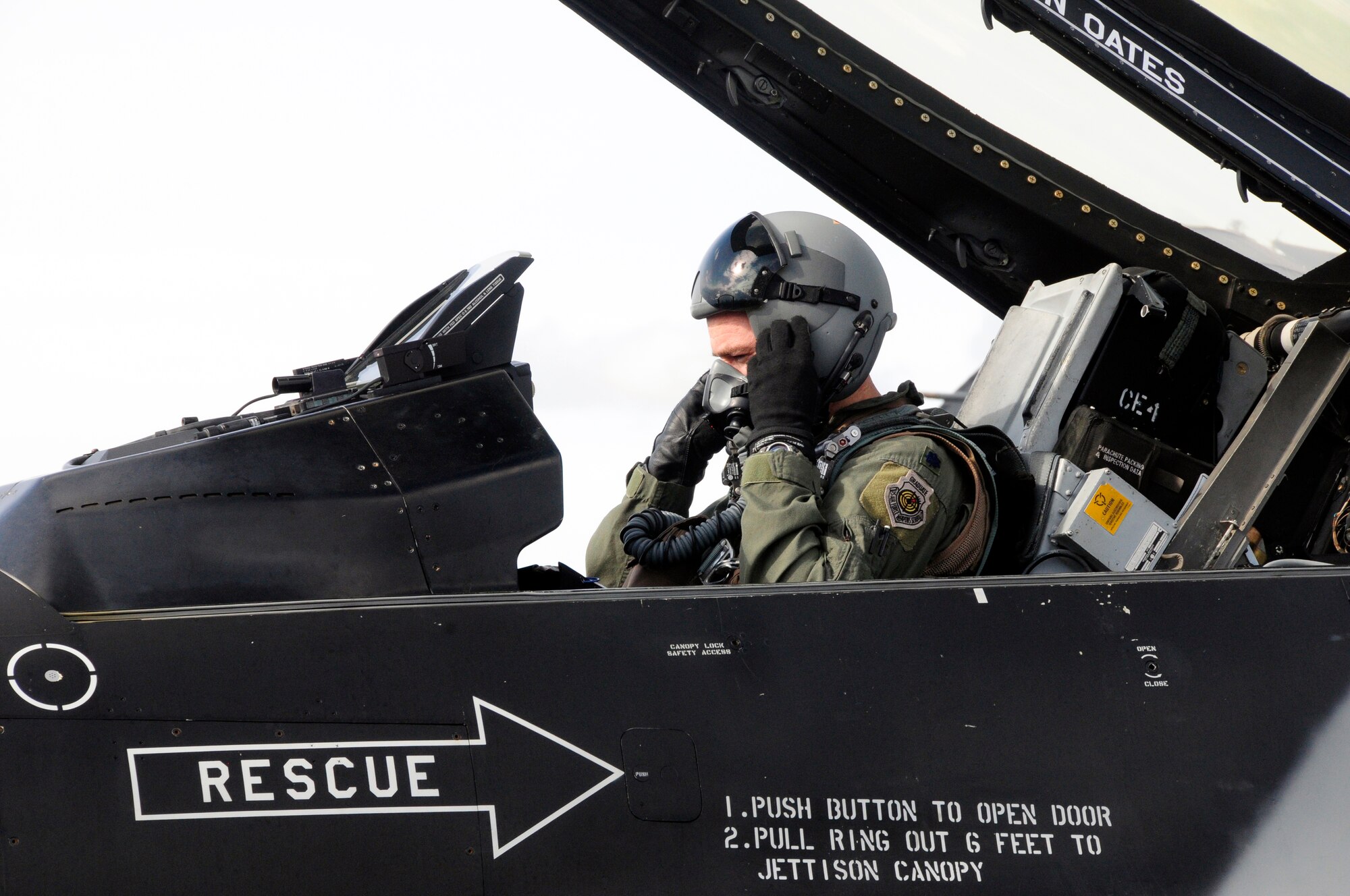Lt. Col. Todd Emmons prepares for his flight here Monday. The mission of the 18th Aggressor Squadron is to prepare U.S. and allied forces for combat by providing realistic combat training, in the air and on the ground. Colonel Emmons is the 18th Aggressor Squadron commander. (U.S. Air Force photo/Senior Airman Rachelle Coleman)