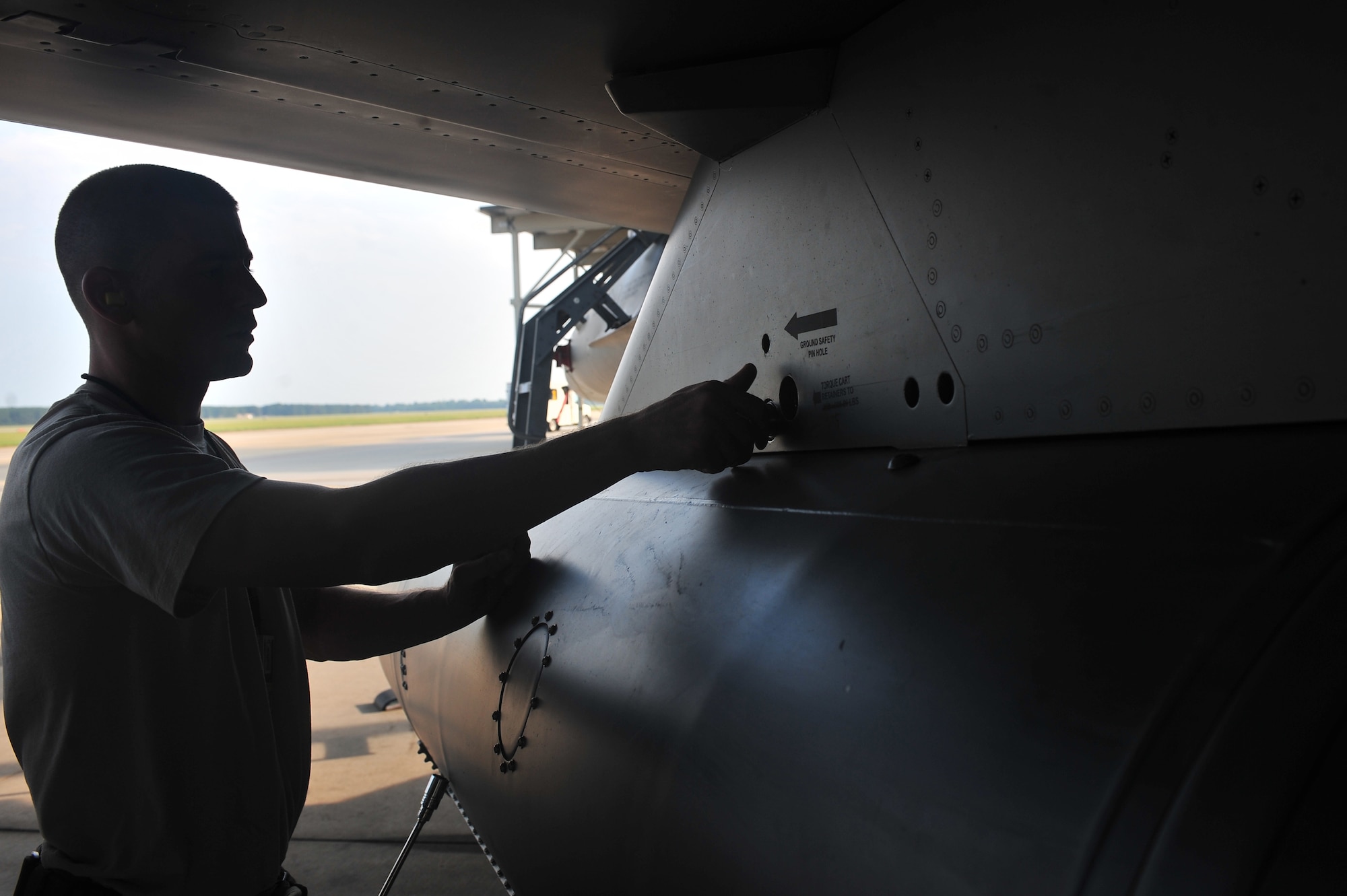 U.S. Air Force Staff Sgt. Jason Bachtel, 55th Aircraft Maintenance Unit Air Craft armament, inspects a jet to make sure everything is functioning properly at Shaw Air Force Base, S.C. August 19, 2011. Maintainers ensure jets are in order and up to date so the pilots stay safe. (U.S. Air Force photo by airman 1st Class Ashley Gardner/ Released)