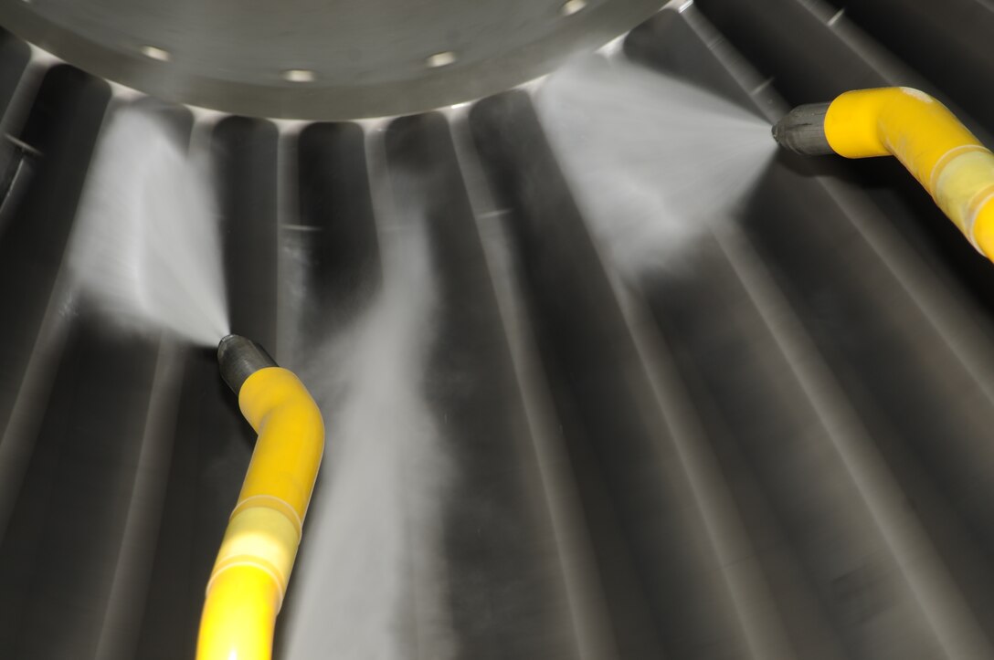 An ECO System engine washer from Pratt & Whitney, Dallas, Tex., is used to clean the inside of a CFM International CFM56 engine (F108 military designation) on a KC-135R Stratotanker at Scott AFB, Ill., on August 24, 2011. The 126th Air Refueling Wing, Illinois Air National Guard, is participating in the engine wash as a fuel conservation measure. Washing the engine is expected to reduce the Exhaust Gas Temperature (EGT) margin by 5-6 degrees resulting in fuel savings and longer engine life. (U.S. AF photo by Master Sgt. Ken Stephens) (Released)