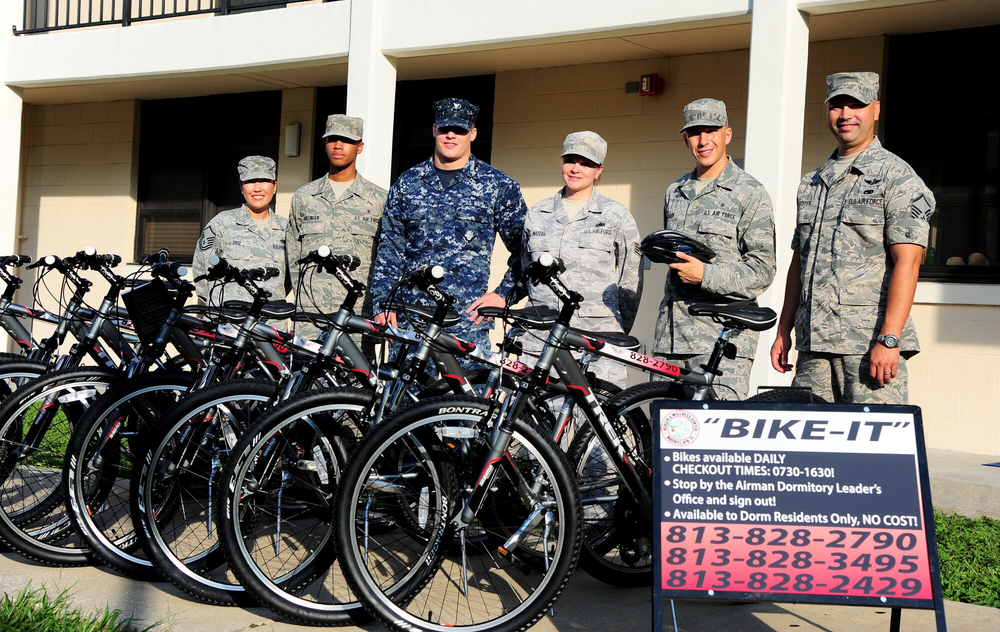 Master Sgt. Unhye Zipay, Airman 1st Class Sean Hollinger, Petty Officer 3rd Class Caleb Rice, Staff Sgt. Rebecca Waters, Airman 1st Class Andrew Glaser, and Master Sgt. Jason Stiyer, show off the new bikes at MacDill Air Force, Fla. 