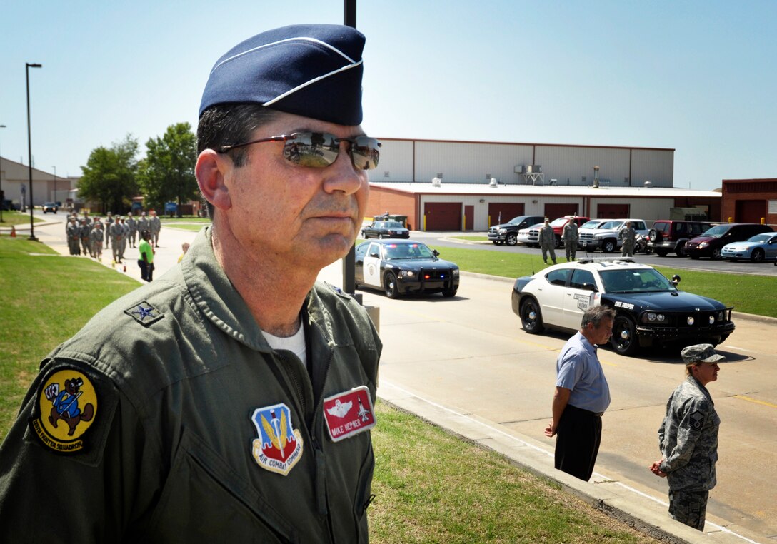 Brigadier General Michael D. Hepner looks on after the funeral procession of Army Specialist Joshua M. Seals departed the Oklahoma Air National Guard base in Tulsa, OK.  Specialist Seals was a member of the 45th Infantry Brigade, Oklahoma National Guard, serving on Operation Enduring Freedom in Afghanistan.  (U.S. Air Force photo by Master Sergeant Preston L. Chasteen)