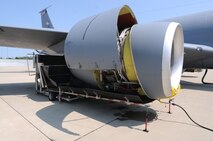 A water collector sits in place underneath a CFM International CFM56 engine (F108 military designation) on a KC-135R Stratotanker during an engine cleaning at Scott AFB, Ill., on August 24, 2011. The collector catches the deionized, chemical free water that is sent through the engine allowing it to be recycled back into the ECO System for filteration and reuse. The 126th Air Refueling Wing, Illinois Air National Guard, is participating in the engine wash as a fuel conservation measure. Washing the engine is expected to reduce the Exhaust Gas Temperature (EGT) margin by 5-6 degrees resulting in fuel savings and longer engine life. (U.S. AF photo by Master Sgt. Ken Stephens) (Released)