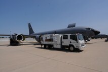 An Eco Wash Team from Pratt & Whitney, Dallas, Tex., use an ECO System to clean the inside of a CFM International CFM56 engine (F108 military designation) on a KC-135R Stratotanker at Scott AFB, Ill., on August 24, 2011. The 126th Air Refueling Wing, Illinois Air National Guard, is participating in the engine wash as a fuel conservation measure. Washing the engine is expected to reduce the Exhaust Gas Temperature (EGT) margin by 5-6 degrees resulting in fuel savings and longer engine life. (U.S. AF photo by Master Sgt. Ken Stephens)