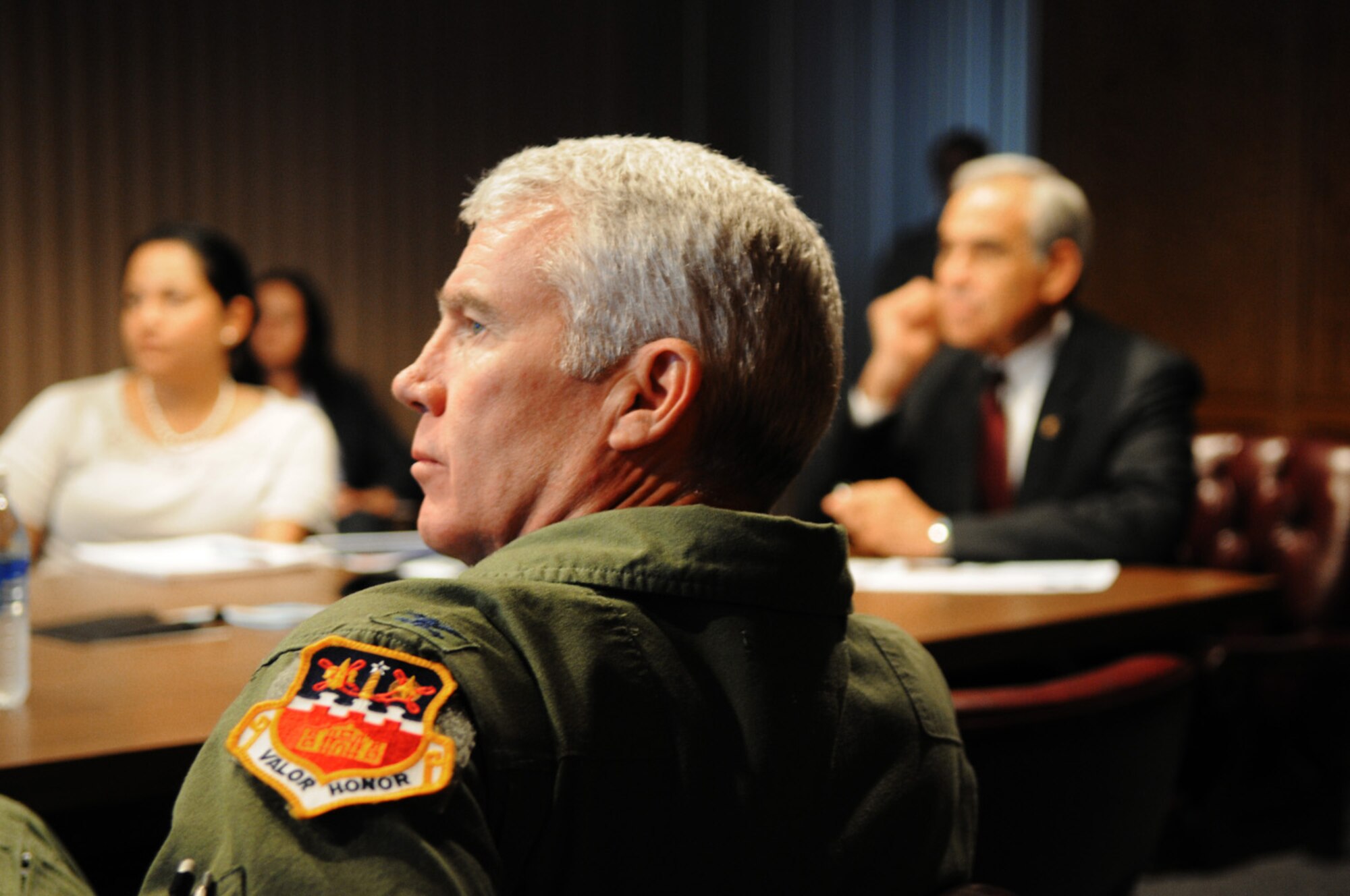 Col. Michael Kelley, vice wing commander of the Texas Air National Guard?s 149th Fighter Wing at Lackland AFB, Texas, listens to a presentation given by the unit?s wing commander, Col. John Kane, during a visit to the F-16 training unit by U.S. Rep. Charlie Gonzalez (TX-20) of San Antonio (right), August 18, 2011. (Air National Guard Photo by SSgt Phil Fountain/Released)
(U.S. Air Force photo/Staff Sergeant Phil Fountain)