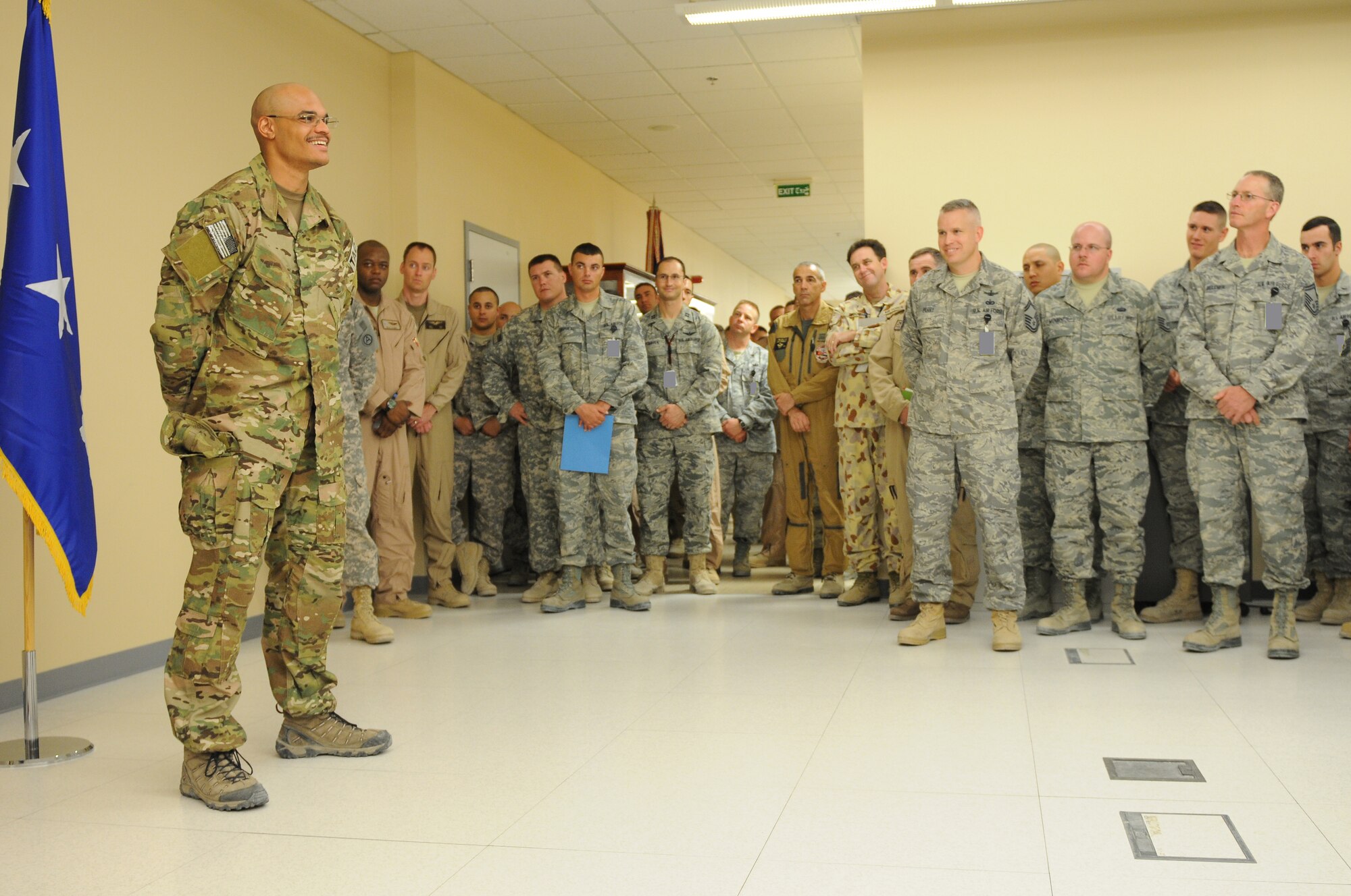 Senior Airman Jorge Henry, a joint terminal attack controller deployed to the 817th Expeditionary Air Support Operations Squadron,  tells the story of a recent firefight during which he called in close air support to protect the Army Infantry unit to which he was attached. Over the course of the nine-hour Aug. 12 battle, Henry was wounded but continued to call in air strikes. Henry, deployed from the 25th Air Support Operations Squadron, Schoefield Barracks, Hawaii, was presented a Purple Heart and an Air Force Combat Action Medal on August 25, 2011, by Lieutenant General David Goldfein, commander of U.S. Air Forces Central Command, while recuperating in Southwest Asia.(U.S. Air Force photo by Master Sergeant Gary J. Rihn)