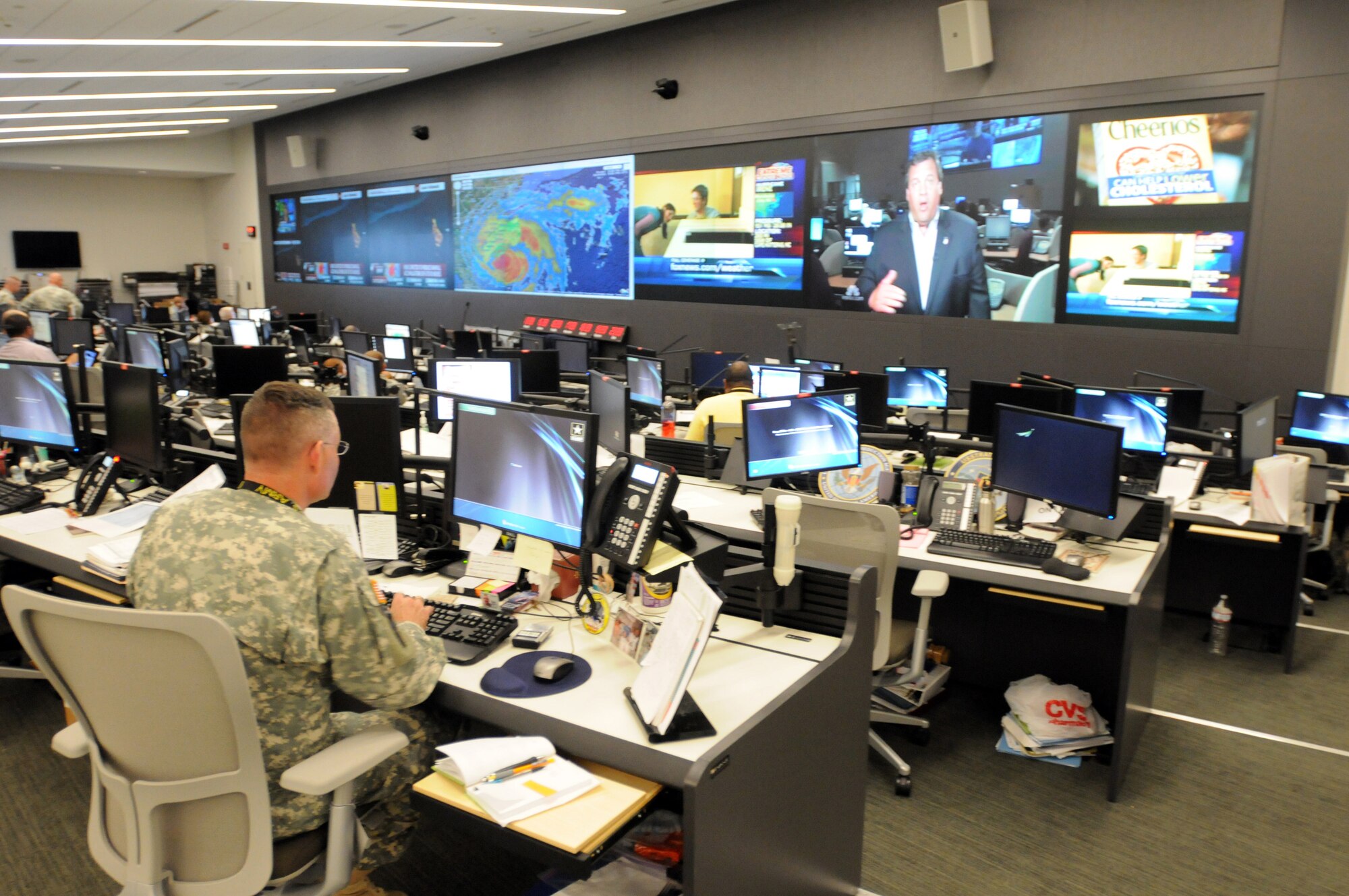 With about 101,000 National Guard members ready to assist eastern seaboard states in the path of Hurricane Irene, Guardsmen at the National Guard Coordination Center in Arlington, Va., seen here Aug. 26, 2011, are monitoring the storm and National Guard support to civilian authorities around the clock. (U.S. Army photo/Staff Sgt. Jim Greenhill)