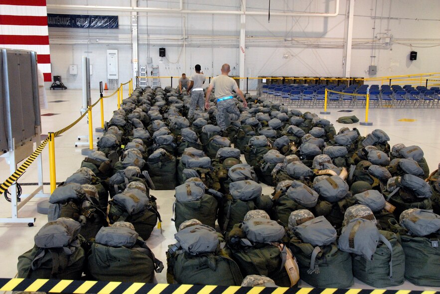 Reserve maintainers from the 442nd Maintenance Group pack their mobility bags in preparation for the phase-one operational readiness inspection, August 2011. The 442nd MXG is part of the 442nd Fighter Wing, an A-10 Thunderbolt II Air Force Reserve unit at Whiteman Air Force Base, Mo. (U.S. Air Force photo/Tech. Sgt. Kent Kagarise)