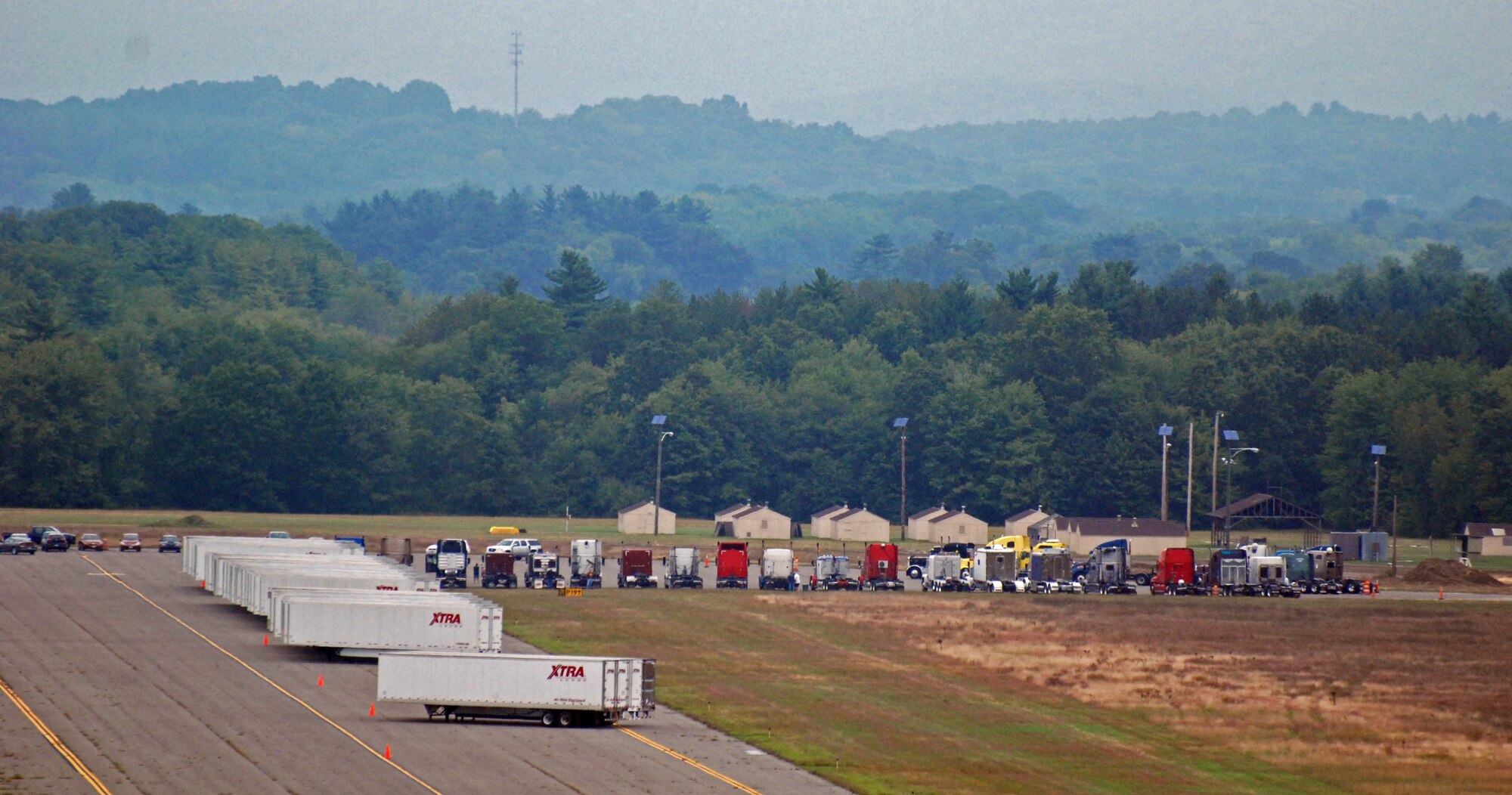 Sixty-one trailers loaded with bottled water, generators, tarps, food, and other emergency supplies arrived at Westover Air Reserve Base Aug. 26 and 27 as Westover partnered with the Federal Emergency Management Agency in preparation for Hurricane Irene, which hit New England Sunday, Aug. 28. In addition, all but two of Westover Air Reserve Base’s C-5 aircraft were evacuated Aug. 26 - 27 to bases in Florida, Delaware and Ohio, in preparation for Hurricane Irene. (US Air Force photo/SrA. Kelly Galloway)
