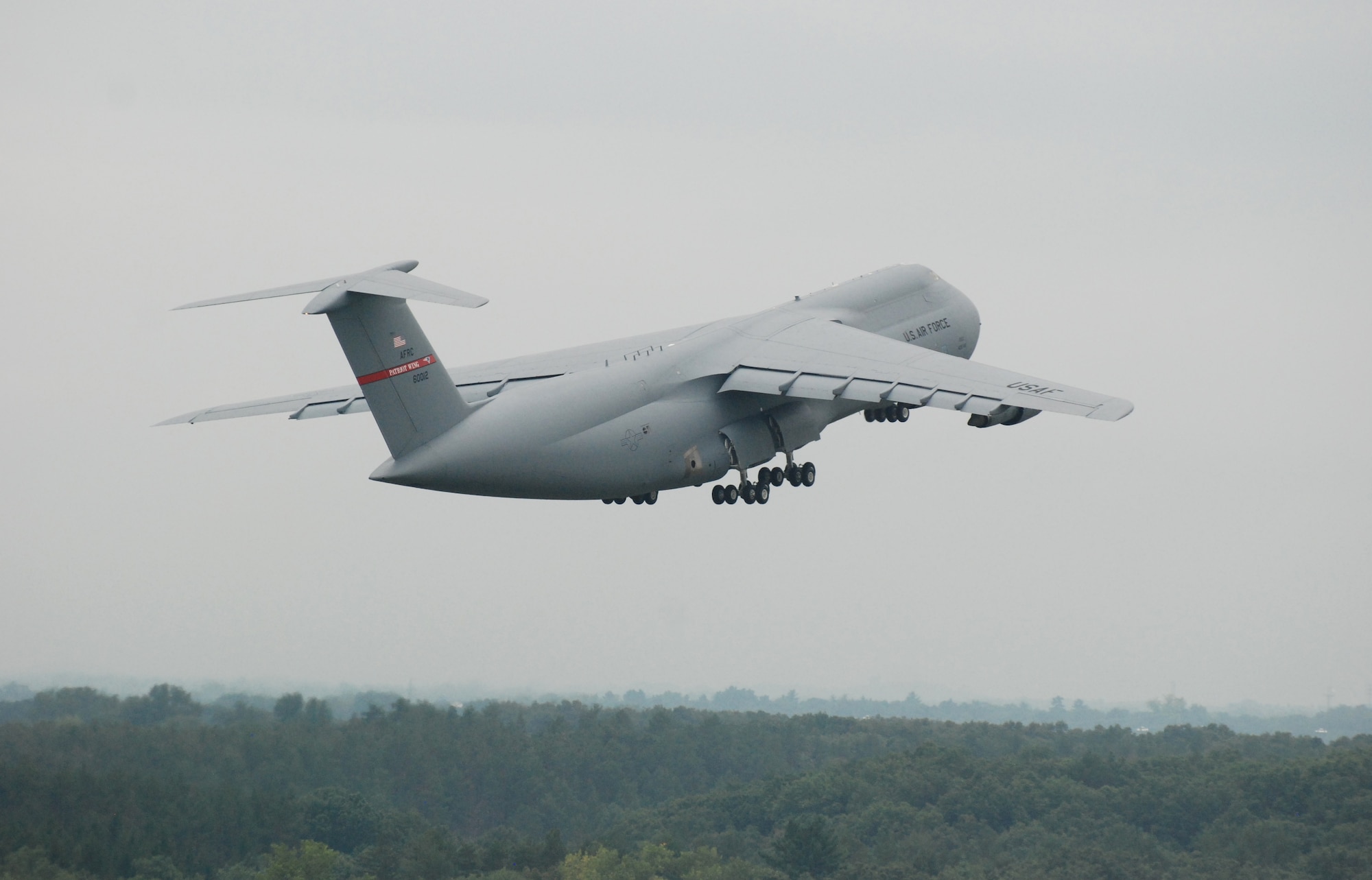 All but two of Westover Air Reserve Base's C-5 aircraft were evacuated Aug. 26 - 27 to bases in Florida and Ohio, in preparation for Hurricane Irene. In addition, about 105 trailers loaded with bottled water, generators, tarps, food, and other emergency supplies arrived here Aug. 26 and 27 as Westover partnered with the Federal Emergency Management Agency to prepare for the hurricane, which is due to hit New England Sunday, Aug. 28. (US Air Force photo/SrA Kelly Galloway)