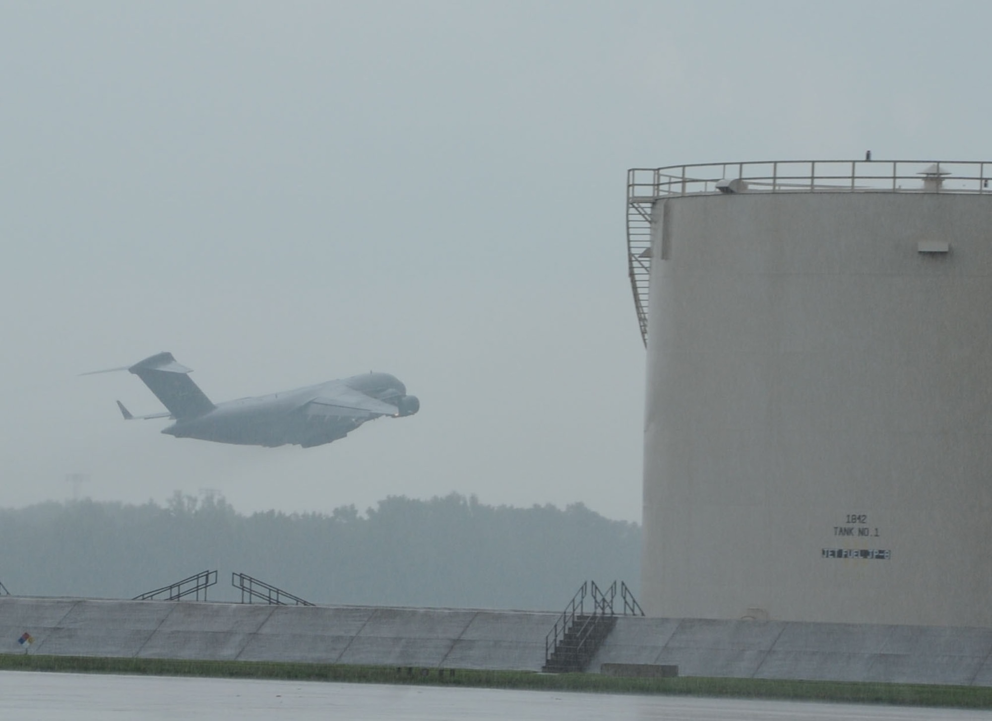 Aircraft from the 305th Air Mobility Wing take off to Grand Forks Air Force Base, N.D., Aug. 26, 2011, in preperation of Hurricane Irene. All JB MDL aircraft are being evacuated to Air Force Base's around the country. (U.S. Air Force photo by Airman 1st Class Bryan Swink/Released)