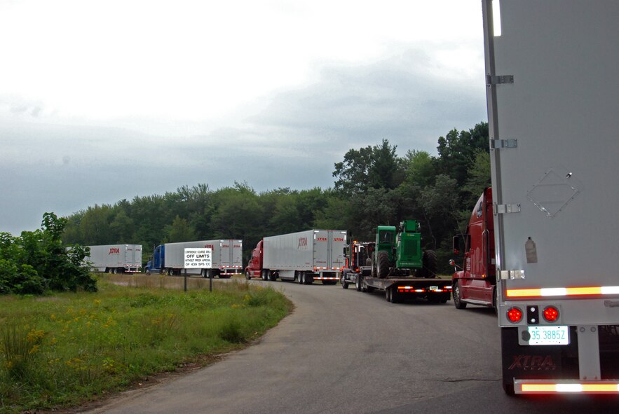 About 105 trailers loaded with bottled water, generators, tarps, food, and other emergency supplies arrived at Westover Air Reserve Base Aug. 26 and 27 as Westover partnered with the Federal Emergency Management Agency to prepare for Hurricane Irene, which hits New England Sunday, Aug. 28. In addition, all but two of Westover's C-5 aircraft were evacuated Aug. 26 - 27 to bases in Florida and Ohio. 

(US Air Force photo/SrA Kelly Galloway)