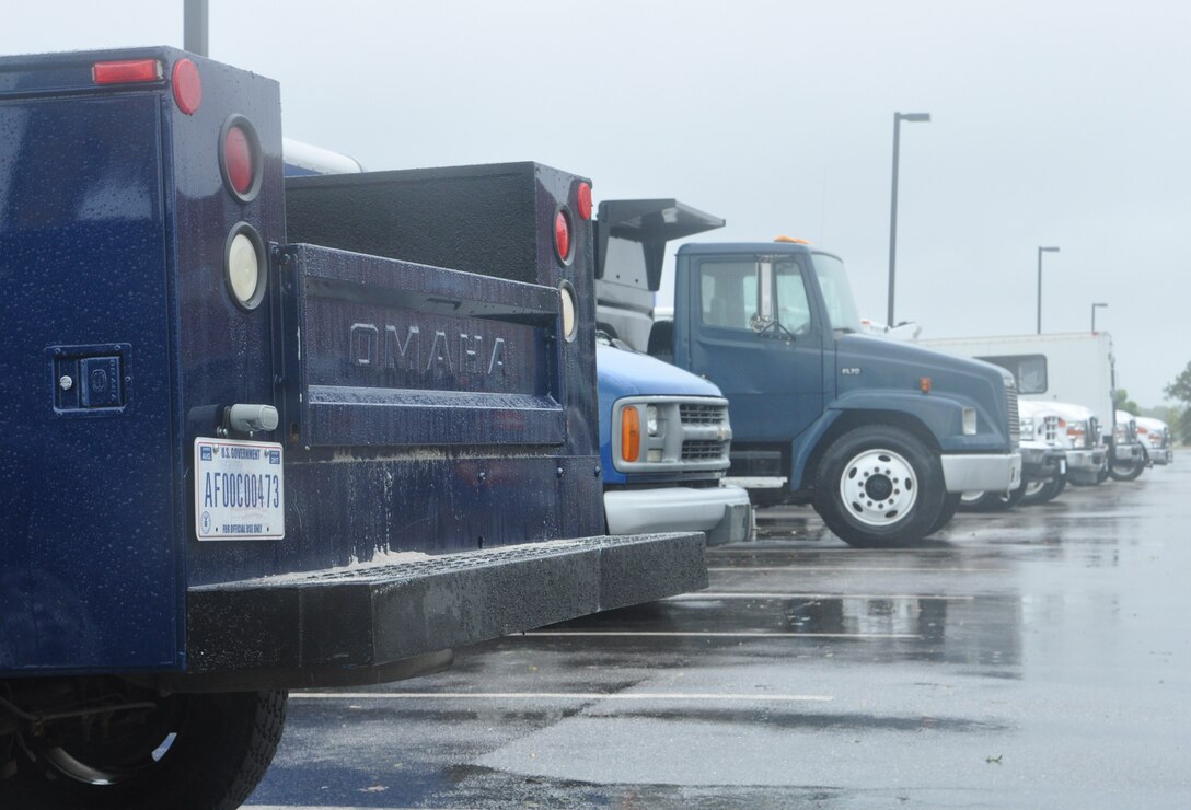 Government-owned vehicles sit in a temporary marshalling yard at USAF Hospital Langley as Hurricane Irene approaches Langley Air Force Base, Va., Aug. 27, 2011. Joint Base Langley-Eustis implemented evacuations, base closures and infrastructure protection measures to mitigate storm damage at Langley AFB and Fort Eustis. (U.S. Air Force photo by Senior Airman Jason J. Brown/RELEASED)