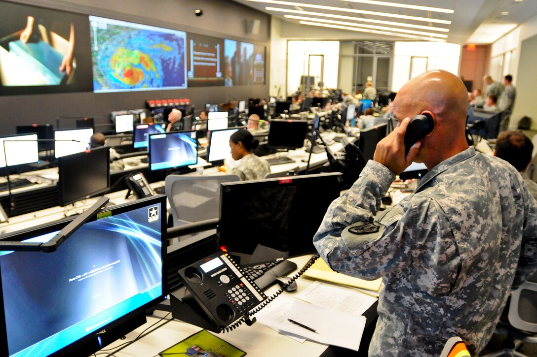 The National Guard Command Center in Arlington, Va., monitors Hurricane Irene to support National Guard and civilian authorities, Aug. 26, 2011.