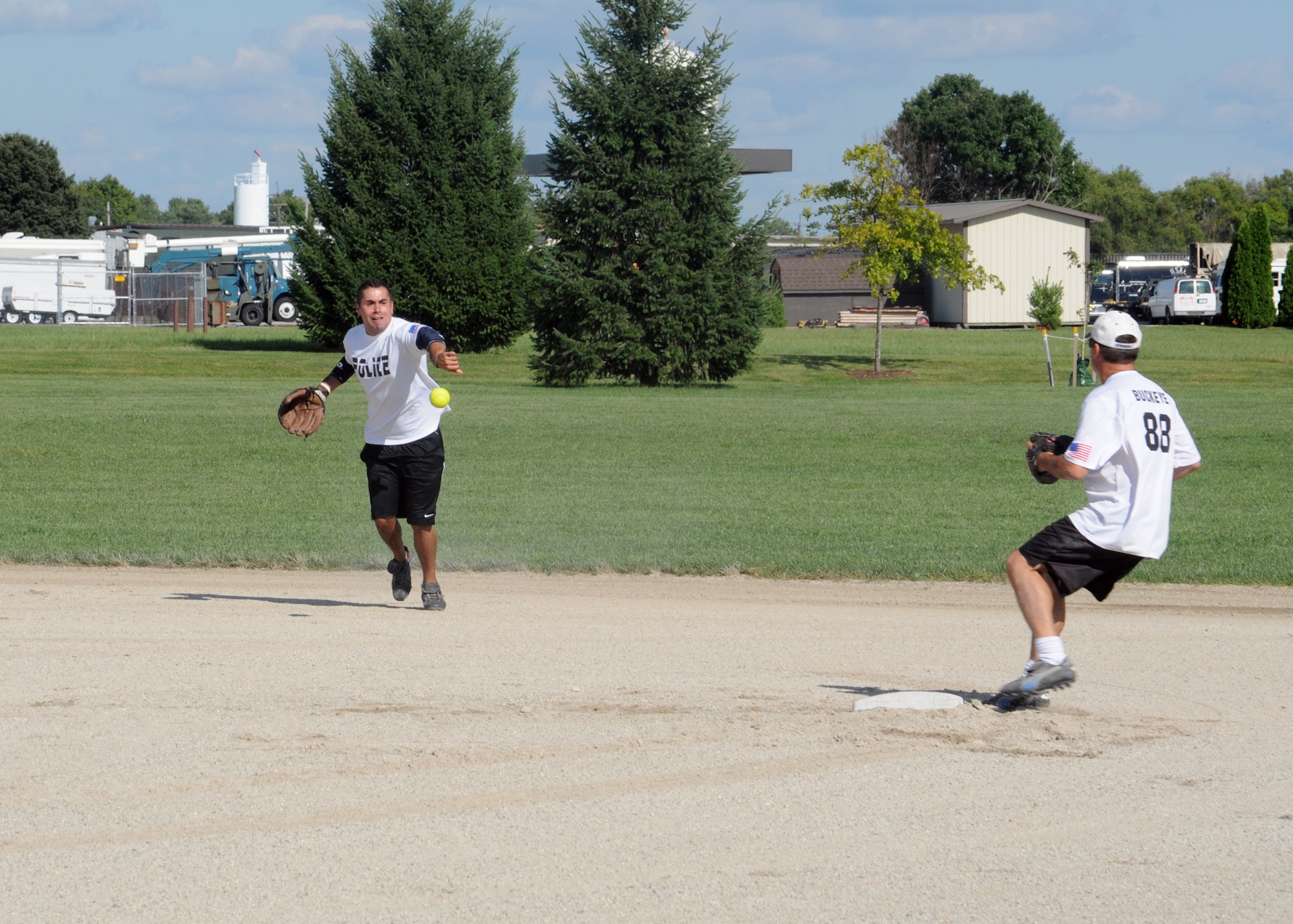GRISSOM AIR RESERVE BASE, Ind. -- After giving up 7 runs in the first inning the Cops tighten up their defense and rallied to beat the Engineers 13-12 in the Grissom intramural softball championship game. (U.S. Air Force photo/Staff Sgt. Carl Berry)
