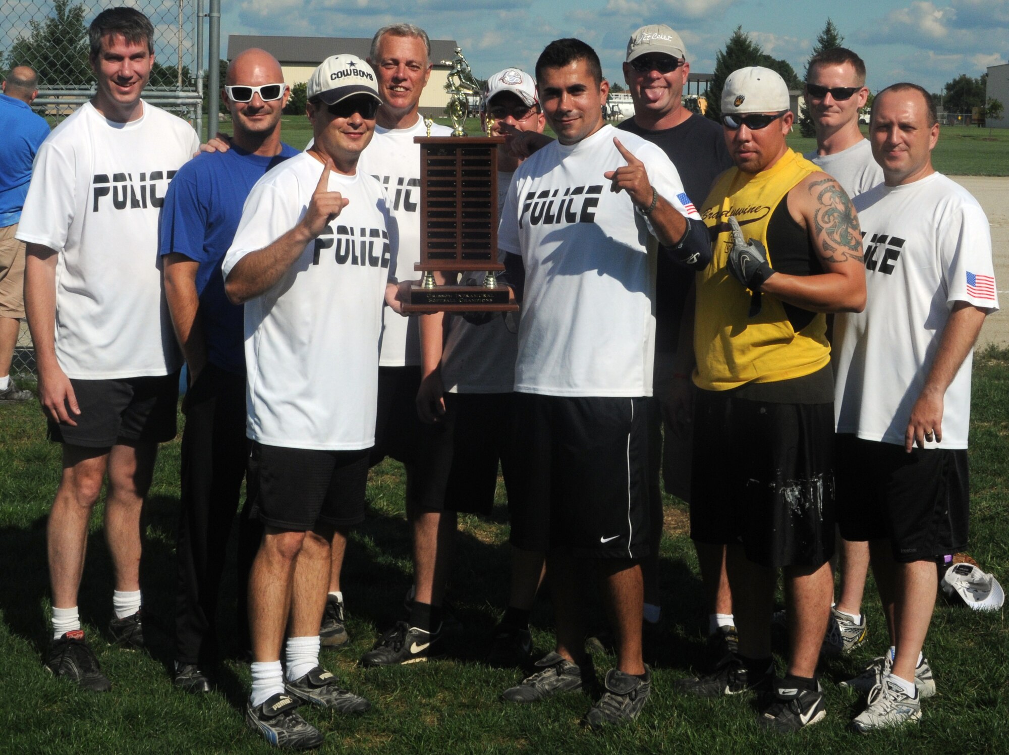 GRISSOM AIR RESERVE BASE, Ind. -- The Cops were victorious against the Civil Engineers in Grissom intramural softball tournament. In a double elimination tournament the Cops had to win two straight games in the finals to take home the trophy. (U.S. Air Force photo/Staff Sgt. Carl Berry)