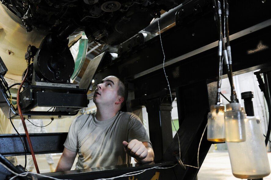 KUNSAN AIR BASE, Republic of Korea -- Senior Airman Eric MacPherson, 8th Maintenance Squadron aerospace propulsion journeyman, performs maintenance on an F-16 Fighting Falcon engine here Aug. 25. The 8th Maintenance Group also provides munitions, aircraft maintenance and maintenance operations support. (U.S. Air Force photo/Senior Airman Brittany Y. Bateman)