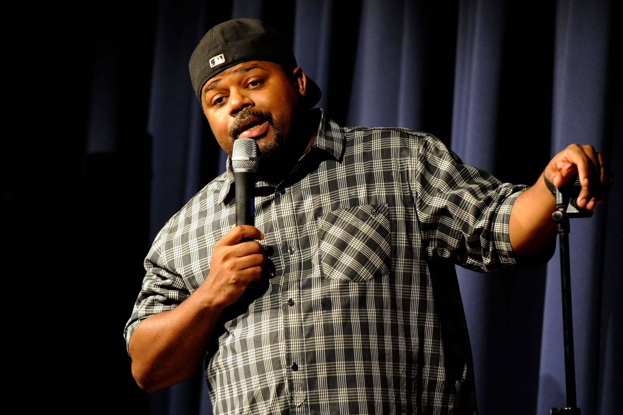 MISAWA AIR BASE, Japan -- Comedian "C-Dawg" entertains the Misawa community at the collocated club here Aug. 26. "C-Dawg" has shared the stage with comedians Chris Tucker, Jamie Foxx and Steve Harvey and has appeared on Black Entertainment Television's "Comic View." (U.S. Air Force photo/Tech. Sgt. Marie Brown)