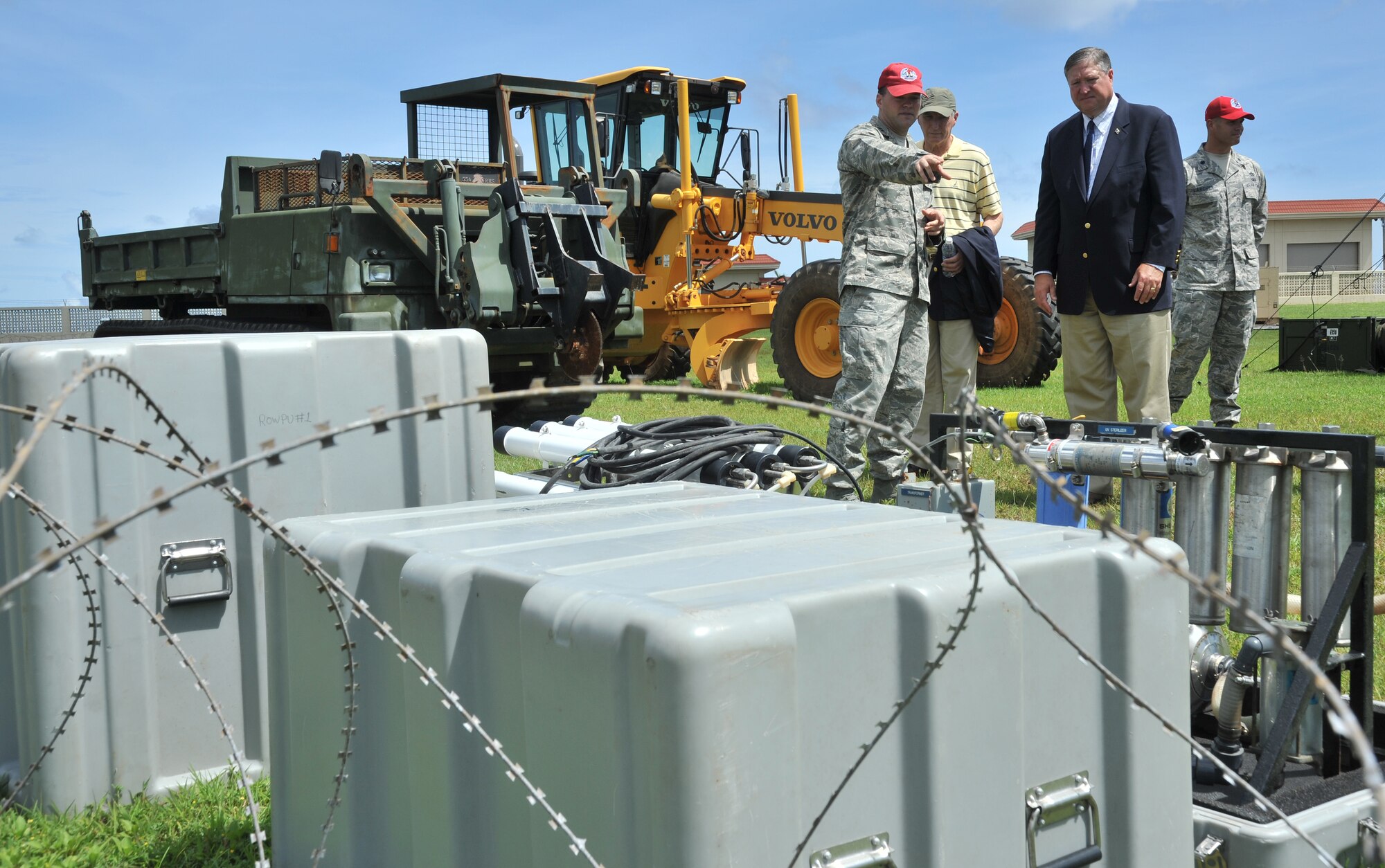 Capt. John Stiles, 554th RED HORSE Squadron, briefs Secretary of the Air Force Michael Donley on several pieces of equipment used during contingency responses during a visit to Andersen Air Force Base, Guam, on Aug. 29, 2011. During the visit, Donley met with senior leaders, and the men and women of the 36th Wing, to discuss the wing’s role in the security and stability of the Asia-Pacific region. (U.S. Air Force photo/Staff Sgt. Alex Montes)
