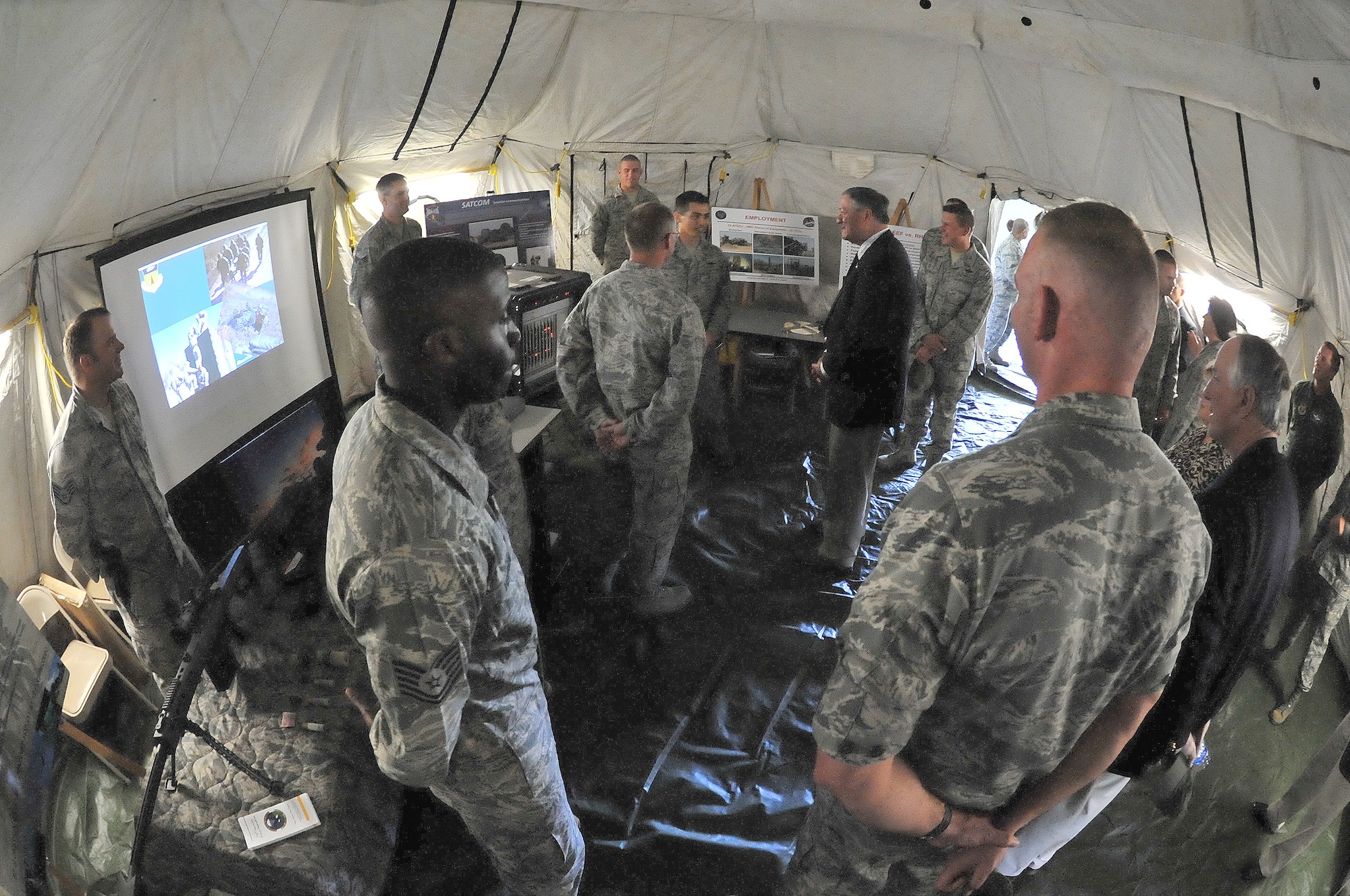 Secretary of the Air Force Michael Donley learns about the Contingency Response Group at Andersen Air Force Base, Guam, on Aug. 29, 2011, during a base visit. During the visit, Donley met with senior leaders, and the men and women of the 36th Wing, to discuss the wing’s role in the security and stability of the Asia-Pacific region. (U.S. Air Force photo/Staff Sgt. Alex Montes)
