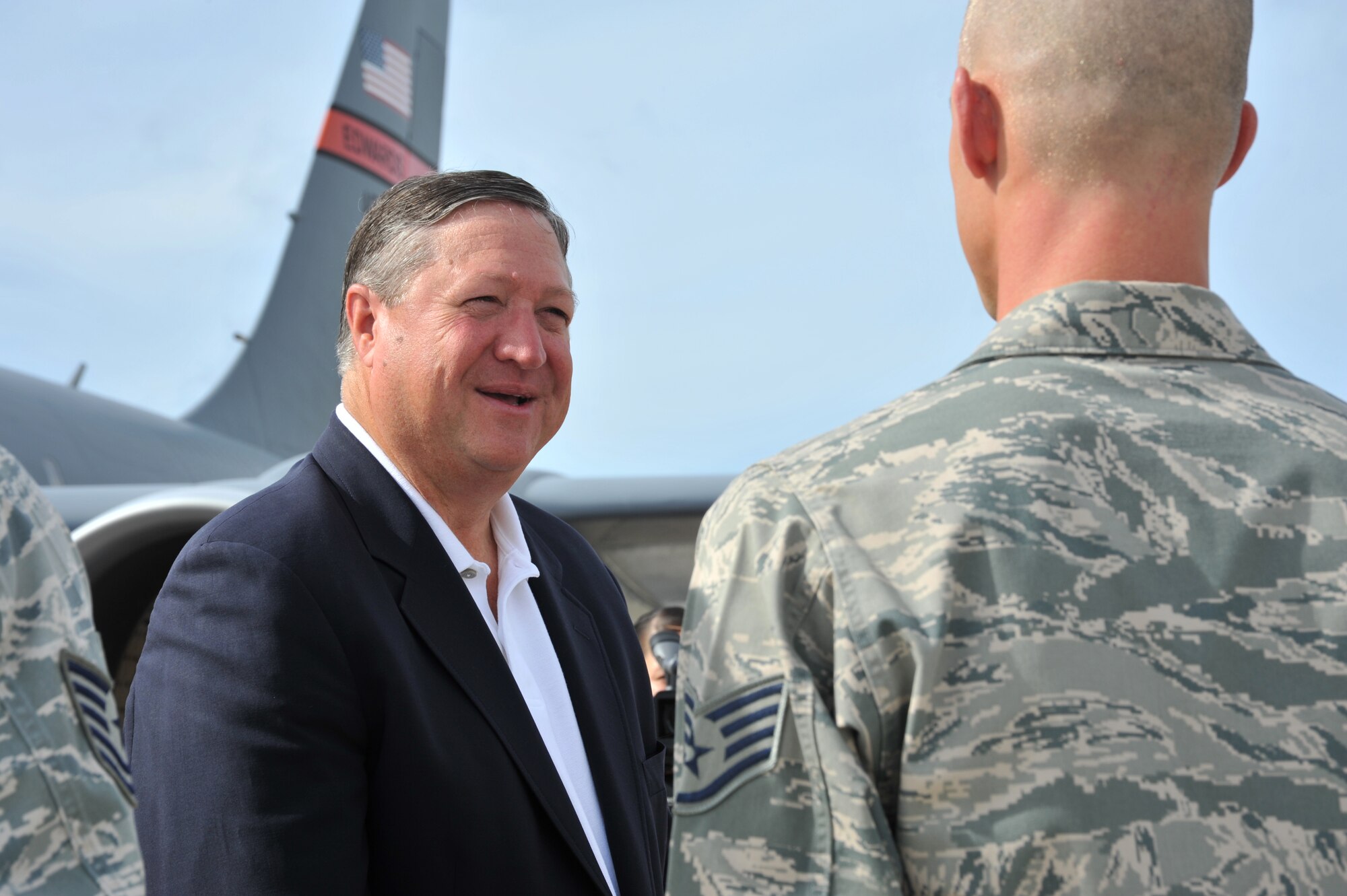 Secretary of the Air Force Michael Donley talks with Airmen at Andersen Air Force Base, Guam, during a base visit Aug. 28, 2011. During the visit, Donley met with senior leaders, and the men and women of the 36th Wing, to discuss the wing’s role in the security and stability of the Asia-Pacific region. (U.S. Air Force photo/Staff Sgt. Alex Montes)