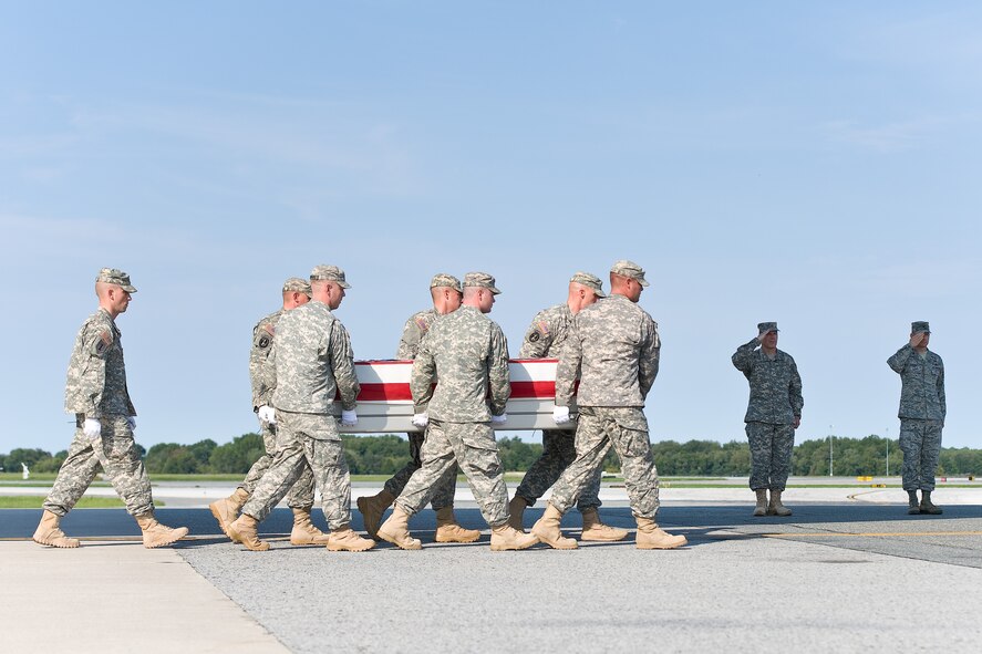 A U.S. Army carry team transfers the remains of Army Pfc. Jesse W. Dietrich, of Venus, Texas, at Dover Air Force Base, Del., Aug. 29, 2011. Dietrich was assigned to the 2nd Battalion, 87th Infantry Regiment, 3rd Brigade Combat Team, 10th Mountain Division, Fort Drum, N.Y. (U.S. Air Force photo/Roland Balik)