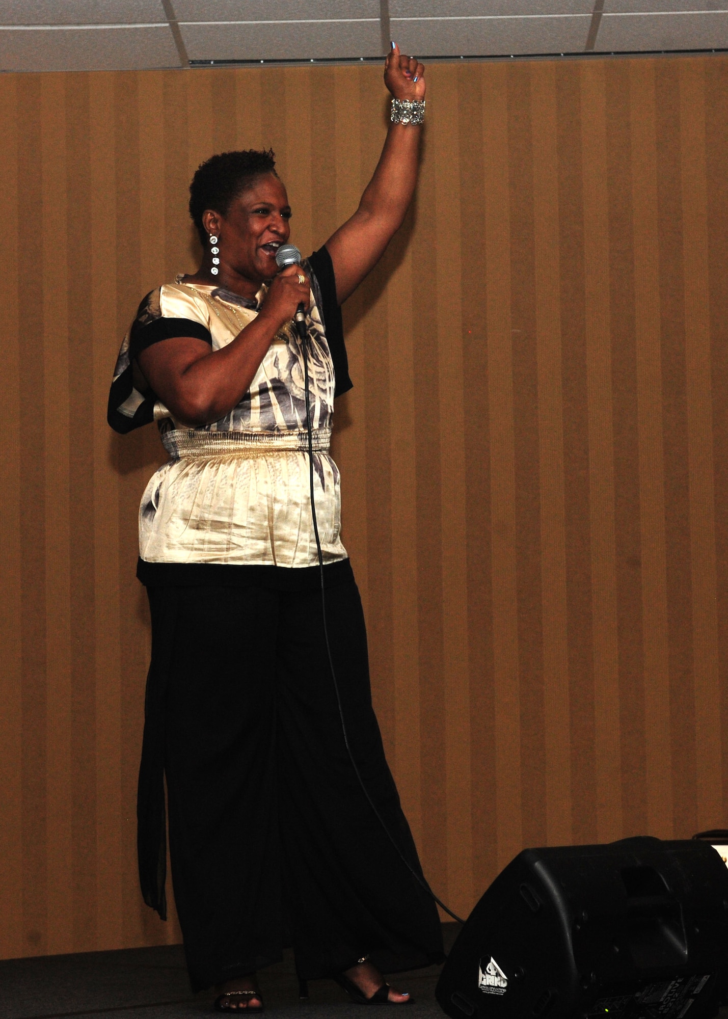 DAVIS-MONTHAN AIR FORCE BASE, Ariz. – Master Sgt. Jacqueline Pinkett-Smith, a Reservist with the 943rd Rescue Group, sings ‘Midnight Train to Georgia’ by Gladys Knight during D-M’s Got Talent here Aug. 25. Sergeant Pinkett-Smith’s rendition won first place in the competition. (U.S. Air Force photo/Airman 1st Class Timothy D. Moore)