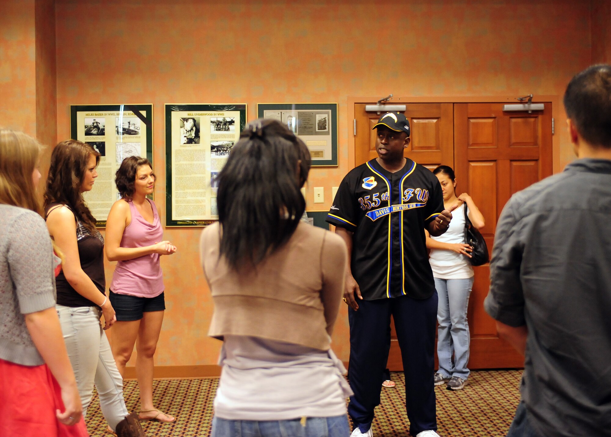 DAVIS-MONTHAN AIR FORCE BASE, Ariz. – Chief Master Sgt. Vincent Howard, 355th Fighter Wing command chief, talks to the contestants of D-M’s Got Talent before the competition here Aug. 25. Chief Howard spoke of the impact that similar events and its participants have on the morale of D-M’s units. (U.S. Air Force photo/Airman 1st Class Timothy D. Moore)