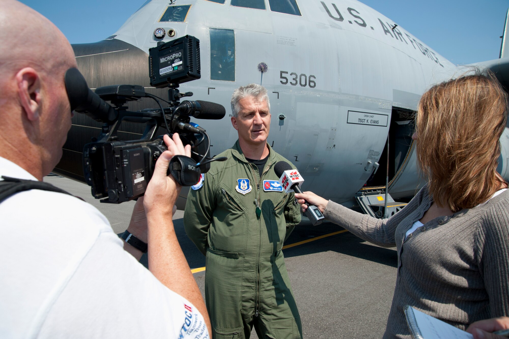 Lt. Col. Jason May, 53rd Weather Reconnaissance Squadron commander, talks to reporters after the squadron’s final flight into Hurricane Irene August 28.  This particular mission took the Hurricane Hunters as far north as New York. To get their final fix on the storm, the crew released a dropsonde into the Hudson Bay – a first for the Hurricane Hunters. The squadron flew out of Hunter Army Airfield, Ga., for the last days of their storm mission. (U.S. Air Force photo/Tech. Sgt. Ryan Labadens)