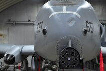 An Airman gets an A-10 Thunderbolt II assigned to the 25th Fighter Squadron ready for munitions August 29, 2011, during an Operation Readiness Exercise. Exercises such as this test Osan's ability to survive and operate during a war-time constraint. (U.S. Air Force photo/Tech. Sgt. Chad Thompson)