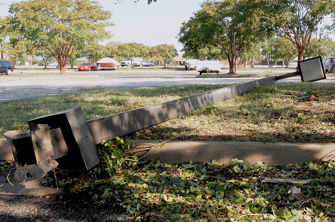A light pole is damaged by strong winds during Hurricane Irene at Langley Air Force Base, Va., Aug. 28, 2011. Winds reached a peak of 67 miles per hour on base during the storm. (U.S. Air Force photo by Airman 1st Class Kayla Newman/Released)