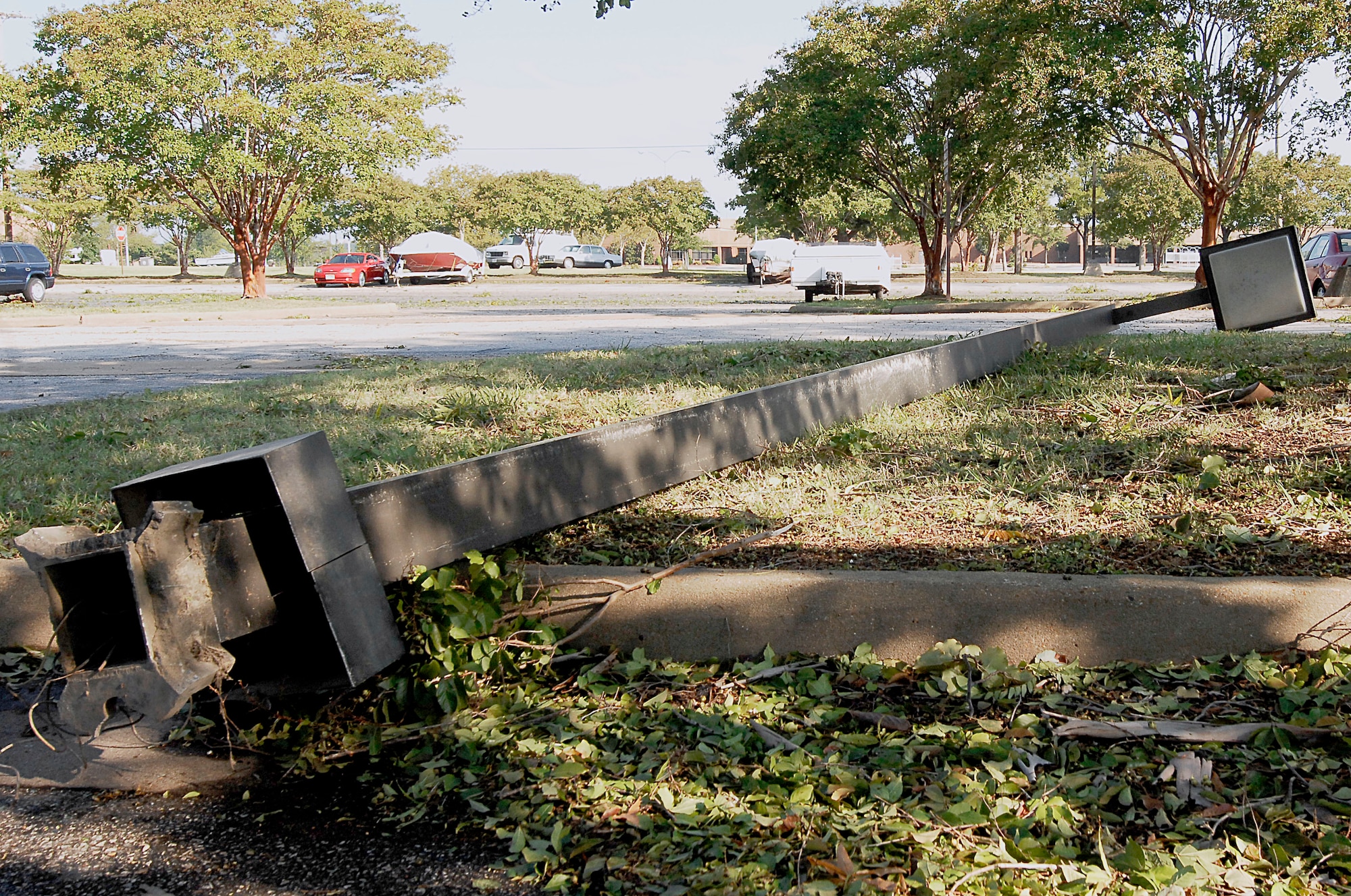 A light pole is damaged by strong winds during Hurricane Irene at Langley Air Force Base, Va., Aug. 28, 2011. Winds reached a peak of 67 miles per hour on base during the storm. (U.S. Air Force photo by Airman 1st Class Kayla Newman/Released)