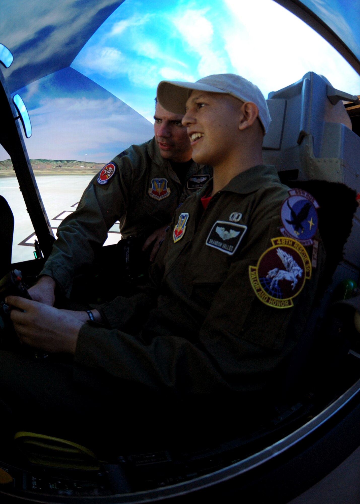 DAVIS-MONTHAN AIR FORCE BASE, Ariz. – Pilot for a Day participant Brandon Valles, 15, experiences the A-10 simulator in the 355th Operations Group as part of the Pilot for the Day program here Aug. 26. (U.S. Air Force photo/Airman 1st Class Christine Halan)