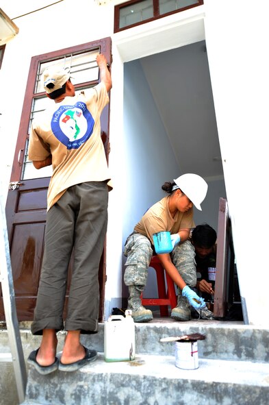 U.S. Air Force Reserve Senior Airman Tiana Corpuz, crew member of the 624th Civil Engineer Squadron, Joint Base Pearl Harbor-Hickam, Hawaii, completes repairs at Ha Huy Tap medical clinic in Ha Tinh Province, Vietnam, on Aug. 19, 2011, in support of Engineering Civic Action Program (ENCAP) Pacific Unity 2011. The ENCAP, led by 13th Air Force, includes more than 60 U.S. and Vietnamese service members, contractors and support personnel, and helps cultivate common bonds, foster goodwill and improve relationships between the United States and Vietnam.  (U.S. Air Force image/Master Sgt. John Herrick)