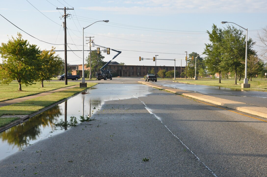 Water pools on Tuskegee Airmen Boulevard near the AAFES Class Six/Shoppette at Langley Air Force Base, Va., following Hurricane Irene Aug. 28, 2011. Officials said the storm knocked out power to more than 4 million people and was responsible for at least 20 deaths along the East Coast. (U.S. Air Force photo by Senior Airman Jason Joel Brown/RELEASED)