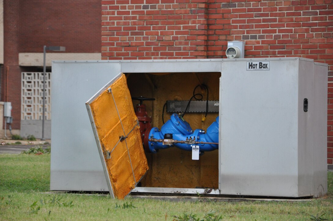 A utility locker door rests unhinged on the Air Combat Command campus as a result of high winds during Hurricane Irene at Langley Air Force Base, Va., Aug. 28, 2011. Officials said the storm knocked out power to more than 4 million people and was responsible for at least 20 deaths along the East Coast. (U.S. Air Force photo by Senior Airman Jason Joel Brown/RELEASED)