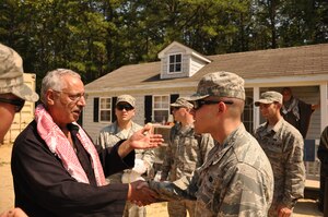 2nd Lt. Mark Flannery meets with the mayor of a nearby village to
pave new relations between U.S. forces and people from the fictitious
Kingdom of Nessor as part of "Operation EAGLE FLAG." The exercise is
designed to provide U.S. forces with an environment to test the knowledge
and skills required for any type of forward operation, in any condition,
regardless of mission or aircraft type. Flannery was the only Airman
specifically recognized for individual efforts during the official
out-brief, provided by the staff from Joint Base McGuire-Dix-Lakehurst's
Expeditionary Operations Center cadre and evaluation team. (U.S. Air Force photo/Senior Airman Jason Brown)
 