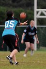KUNSAN AIR BASE, Republic of Korea -- Airmen compete in a powder puff football game here Aug. 26. The game was an event to celebrate Women’s Equality Day. (U.S. Air Force photo/Senior Airman Brittany Y. Bateman)