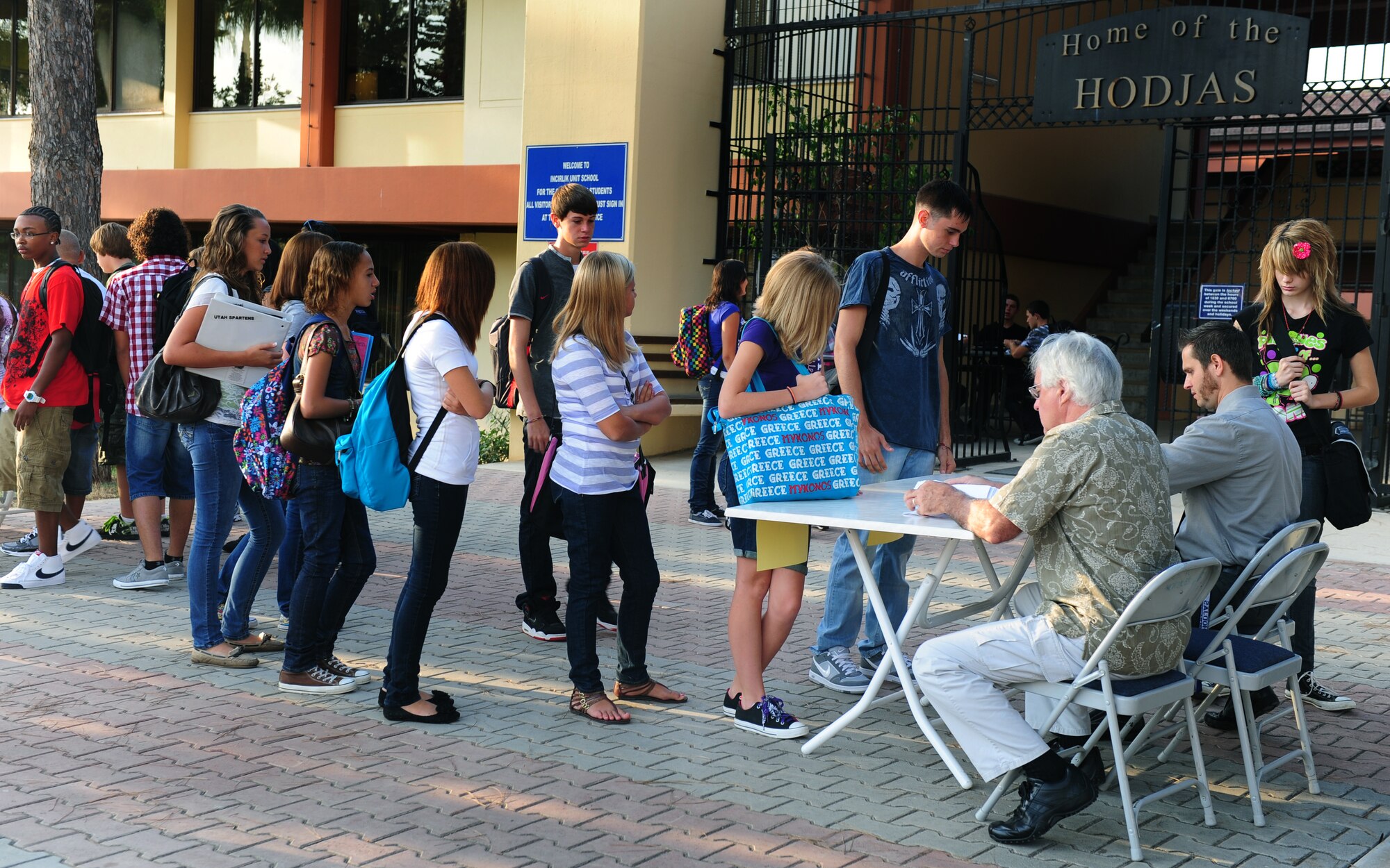 Incirlik Unit School students receive new class schedules on the first day of school Aug. 29, 2011, at Incirlik Air Base, Turkey. All grades began school today except kindergarten, which will begin the day after Labor Day. (U.S. Air Force photo by Senior Airman Anthony Sanchelli/Released)
