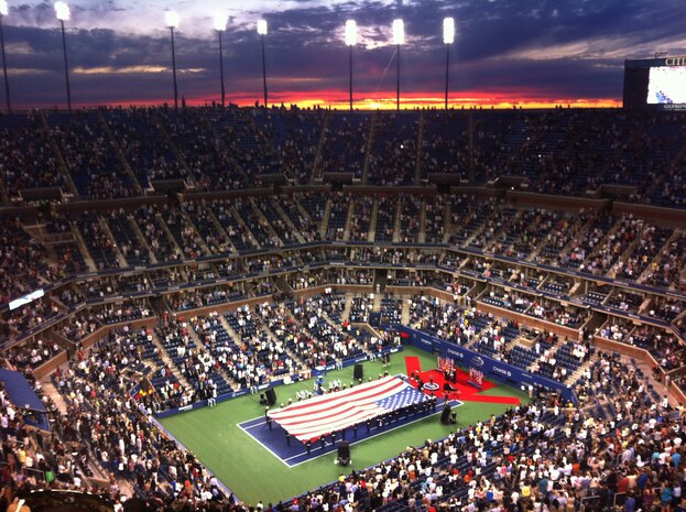 NEW YORK -- Marines presented the American Flag during the opening ceremony at the US Open Tournament in Arthur Ashe Stadium, Aug. 29. The Marines from 6th Communications Battalion, 4th Marine Logistics Group, Marine Forces Reserve are stationed in Floyd Bennett Field, Brooklyn, New York and unfurl the flag annually for the last tennis major of the year for the Grand Slam. Novak Djokovic and Caroline Wozniacki entered the tournament as the top ranked male and female player. Play was delayed two hours as crews finished clearing debris Hurricane Irene left in its wake along the previous day. (Official Marine Corps photo by John Manley / RELEASED)