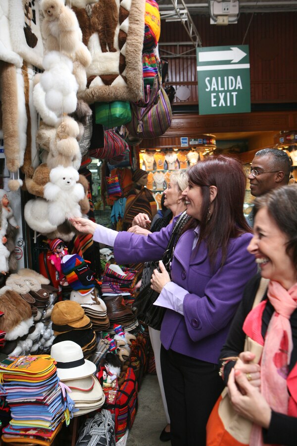 Spouses of Marine Corps and Naval Infantry leaders from North, Central and South America shop in the Mercado Indio, a local market in Lima. The spouses traveled to different sites and attractions in the city as part of the Spouses Program for the Marine Leaders of the Americas Conference (MLAC) 2011.