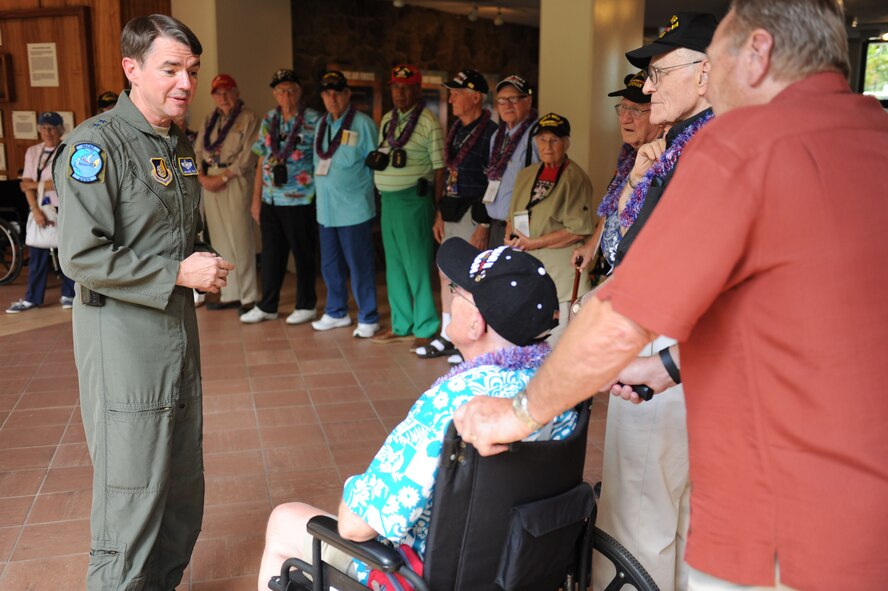 JOINT BASE PEARL HARBOR-HICKAM, Hawaii - Maj. Gen. Jan-Marc Jouas, Pacific Air Forces Director of Operations, Plans, Requirements, and Programs, speaks to World War II veterans during a tour of the Courtyard of Heros here, Aug. 30, 2011. The tour was sponsored by the Greatest Generation Foundation. (U.S. Air Force photo/Staff Sgt. Gustavo Gonzalez)